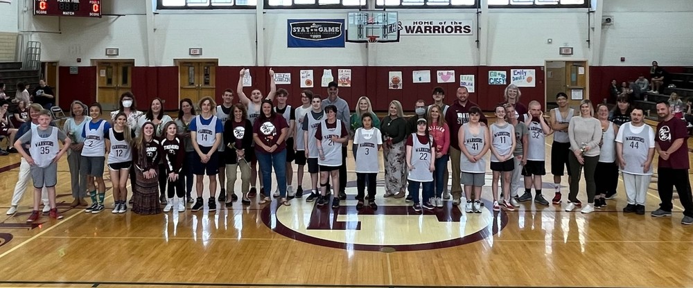 Unified basketball players at teachers on the court
