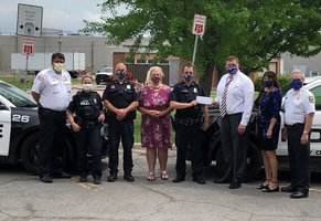 Tonawanda staff makes donation to Police Club